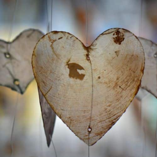 A carved wooden heart reminds us of cultivating a grateful heart.