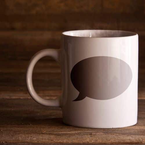 A mug with the word communicate on it reminds us of the importance of nurturing communication in marriage.